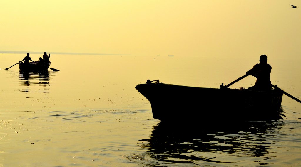 An essential Varanasi experience is a dawn rowing boat ride along the Ganges. (Photo by Mukund Prabhakar)